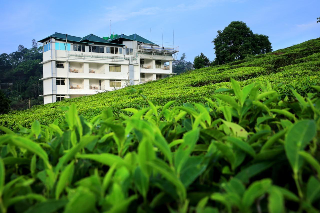 Hôtel Monsoon Grande à Munnar Extérieur photo